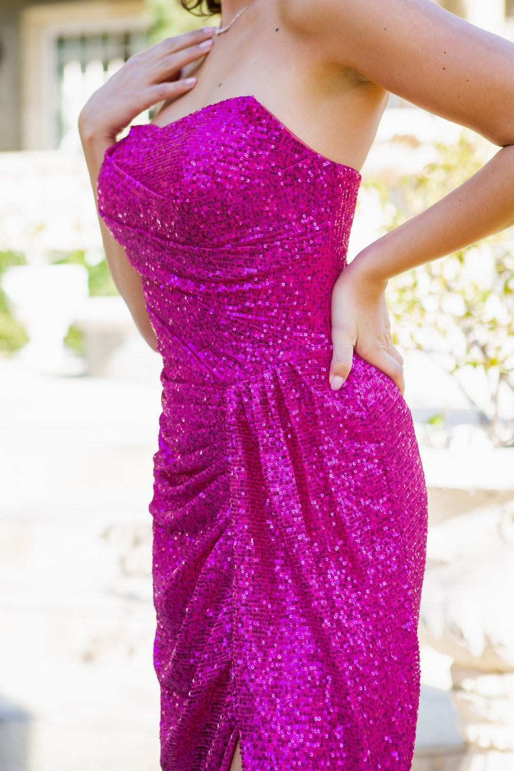 Prom and evening gown with fitted strapless and sequin decoration